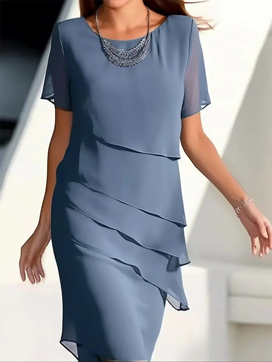 Elegante dameslagenjurk met korte mouwen