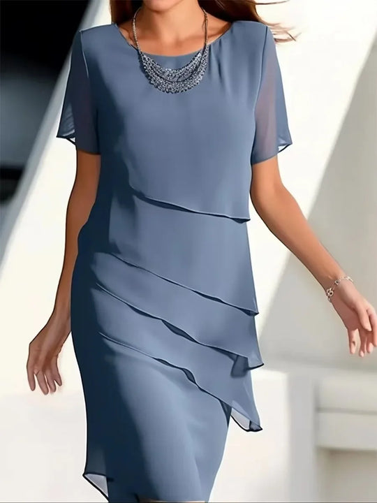 Elegante dameslagenjurk met korte mouwen