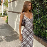 Elegante maxi-jurk met spaghettibandjes en een ruitpatroon