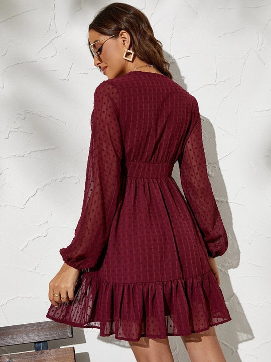 Jurk met Lange, Transparante Mouwen en Ruffles