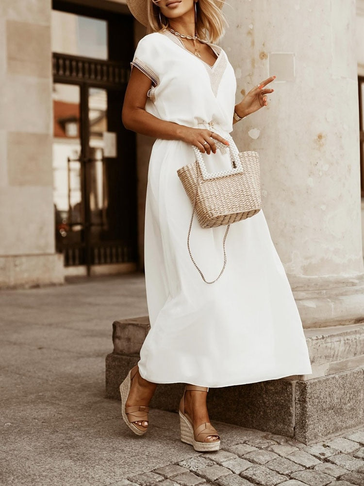 Elegante damesjurk met decoratieve details
