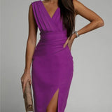 Elegante cocktailjurk met plooien en een split