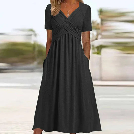 Elegante Midi Jurk met Korte Mouwen en Zakken