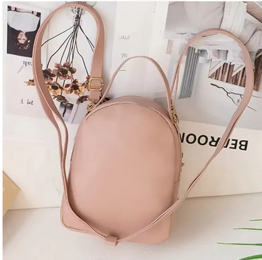 Kleine damesschoudertas met een decoratief flamingomotief