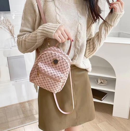 Kleine elegante damesrugzak met een trendy patroon