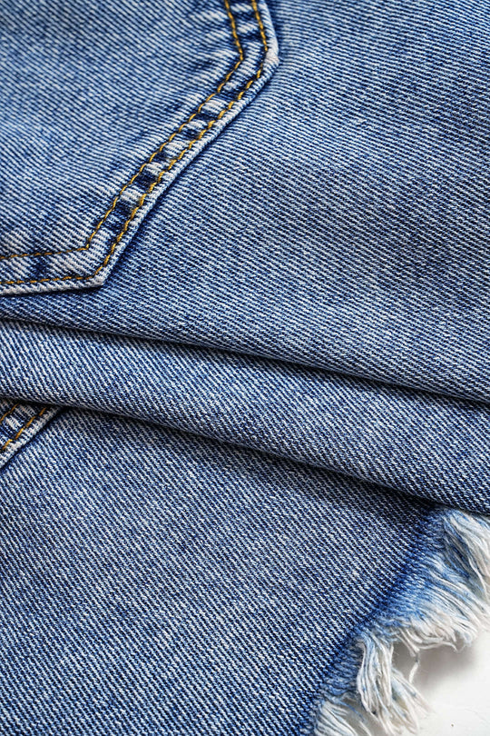 Denim Asymmetrische Gescheurde Knopzak Shorts