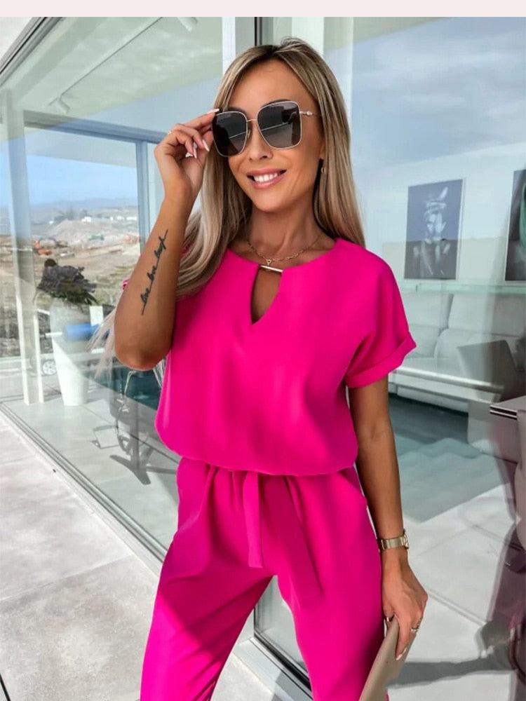 Elara Jumpsuit met Strikdetail – Stijlvol, Comfortabel en Veelzijdig