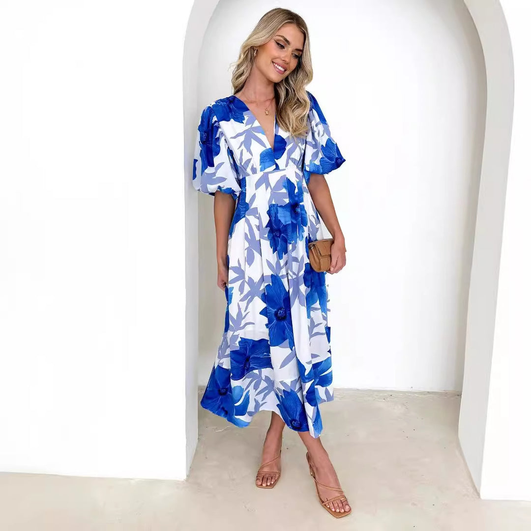 Bloom Elegance – Midi Jurk met Abstracte Bloemenprint