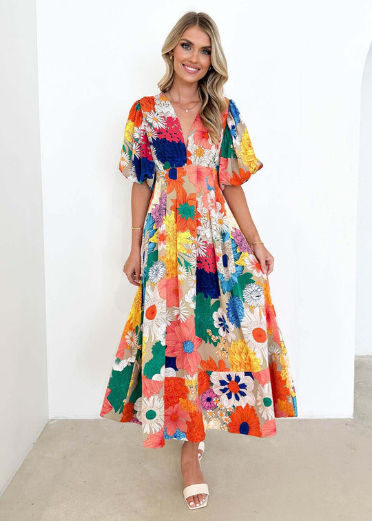Bloom Elegance – Midi Jurk met Abstracte Bloemenprint