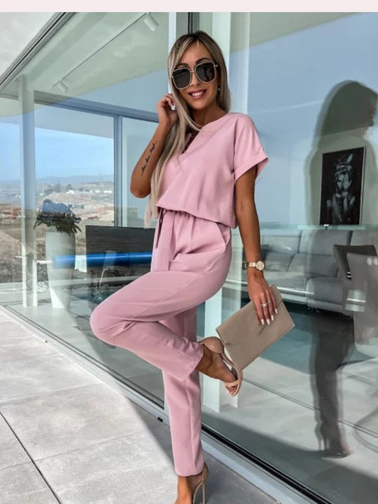 Elara Jumpsuit met Strikdetail – Stijlvol, Comfortabel en Veelzijdig
