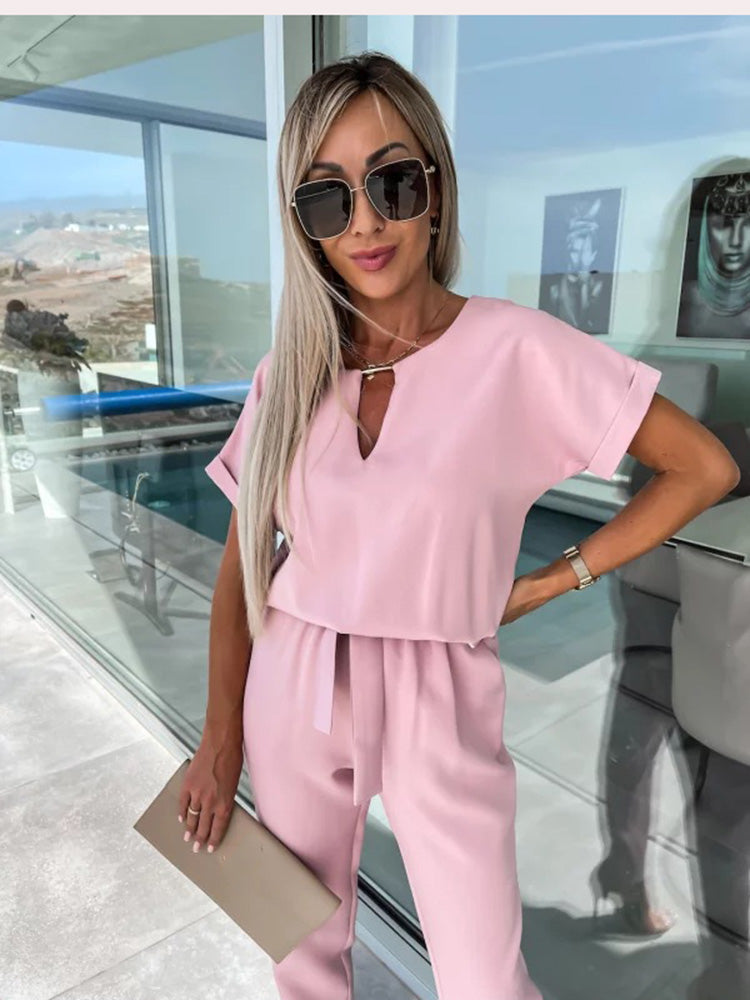 Elara Jumpsuit met Strikdetail – Stijlvol, Comfortabel en Veelzijdig