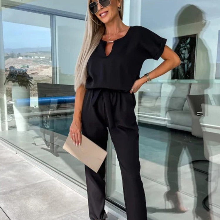 Elara Jumpsuit met Strikdetail – Stijlvol, Comfortabel en Veelzijdig